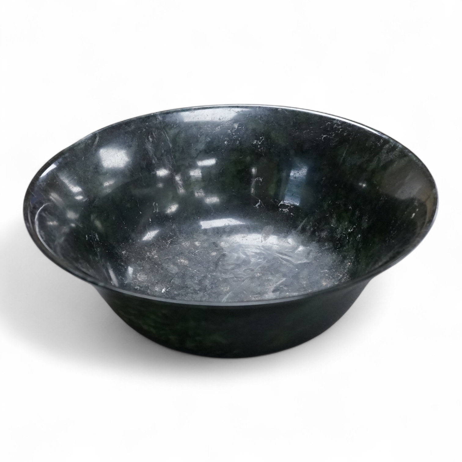 A Chinese spinach green jade bowl, 21cm diameter